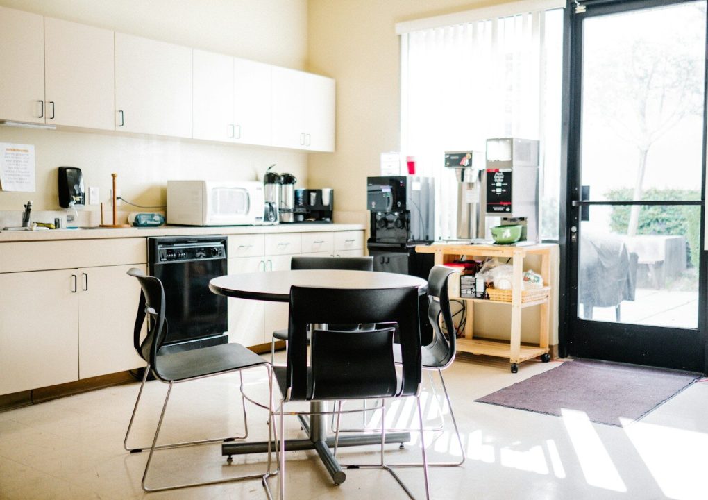 black and white wooden table and chairs