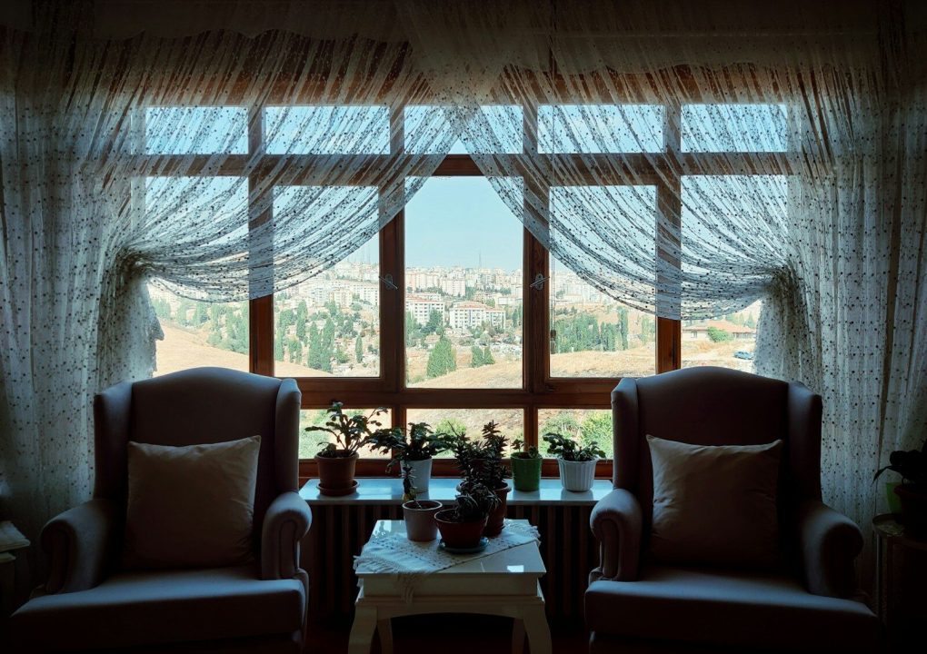 white and brown window curtains